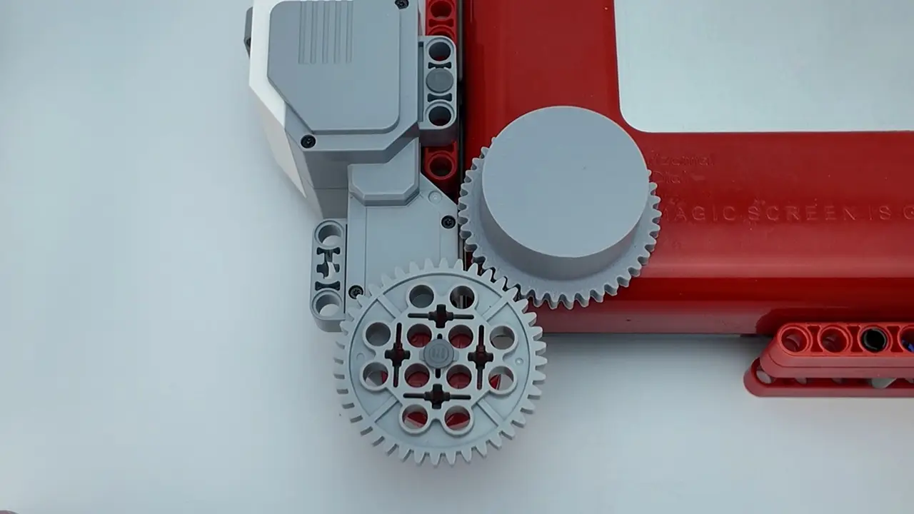Knob caps for an Etch A Sketch: LEGO gear and band versions — modelo 3D