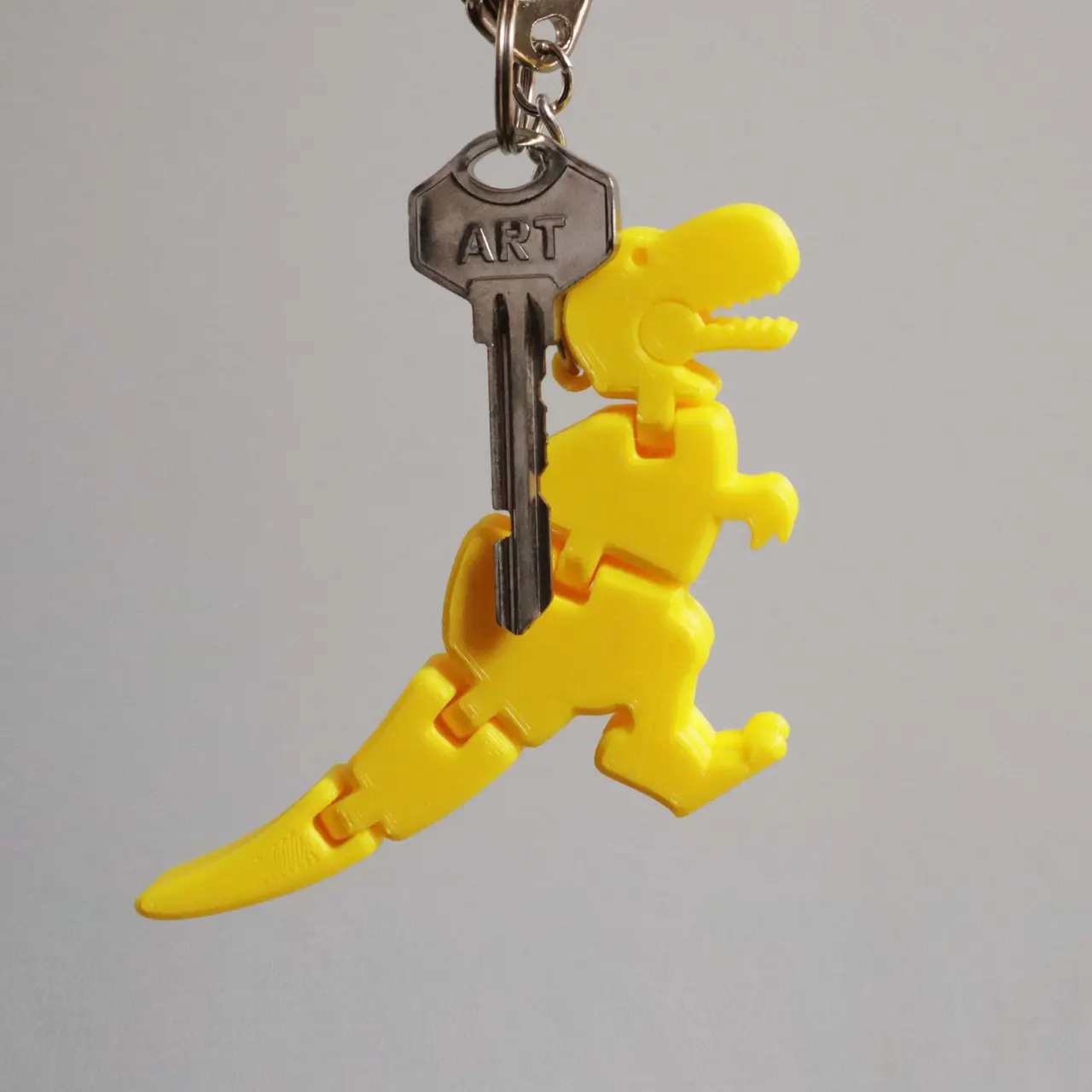 Baby T-rex Flexy Keychain — modelo 3D