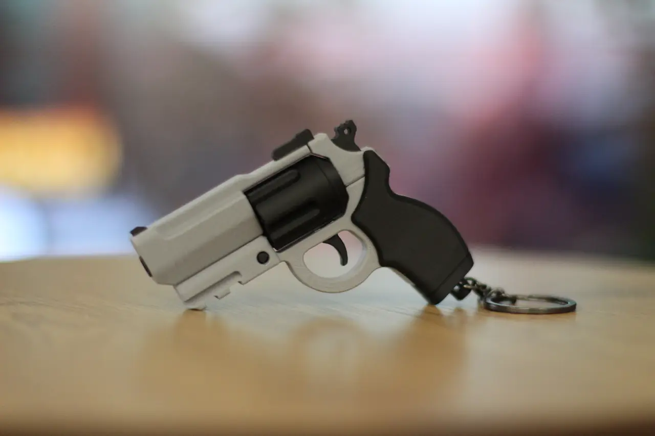 Revolver Fidget Keychain – Slide-Action Toy — modelo 3D