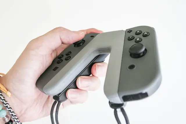 Nintendo Switch Joy-con Grip (store the strap) — modelo 3D