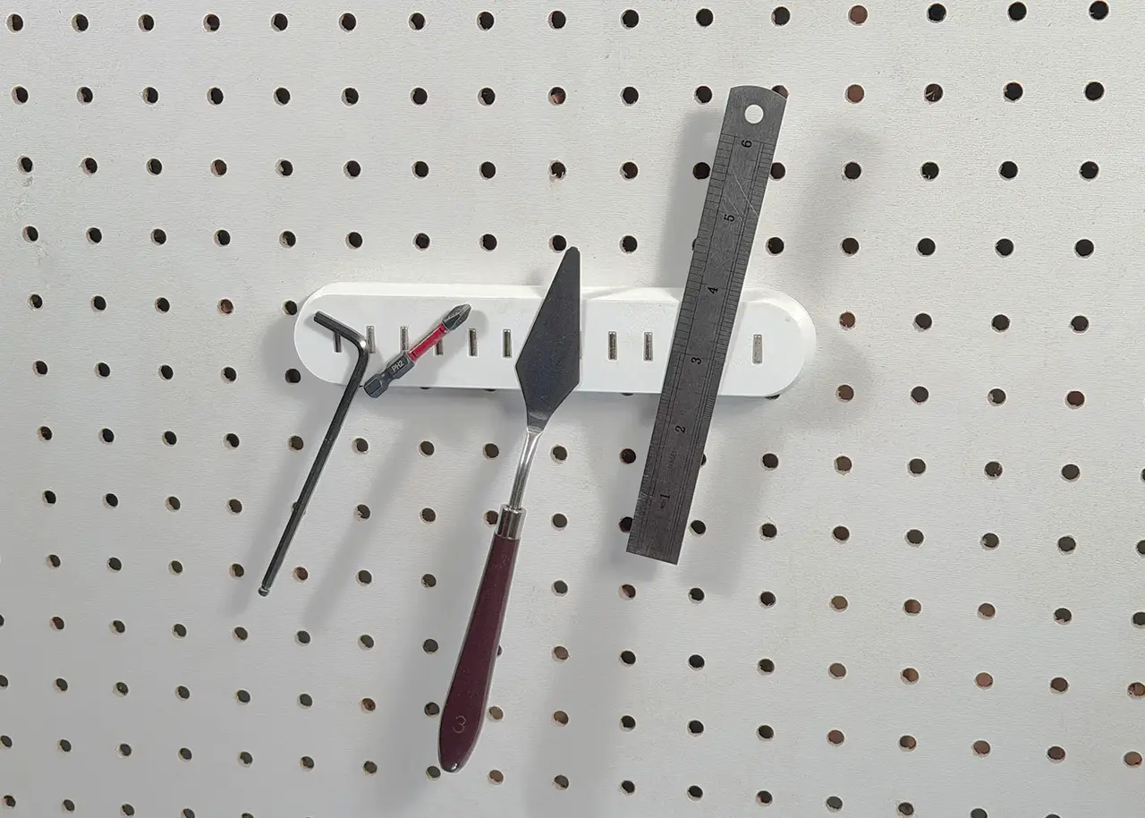 Magnetic Tool Holder Bar for 1/4" Pegboard – 13 Snap-In Magnets, No Glue — modelo 3D