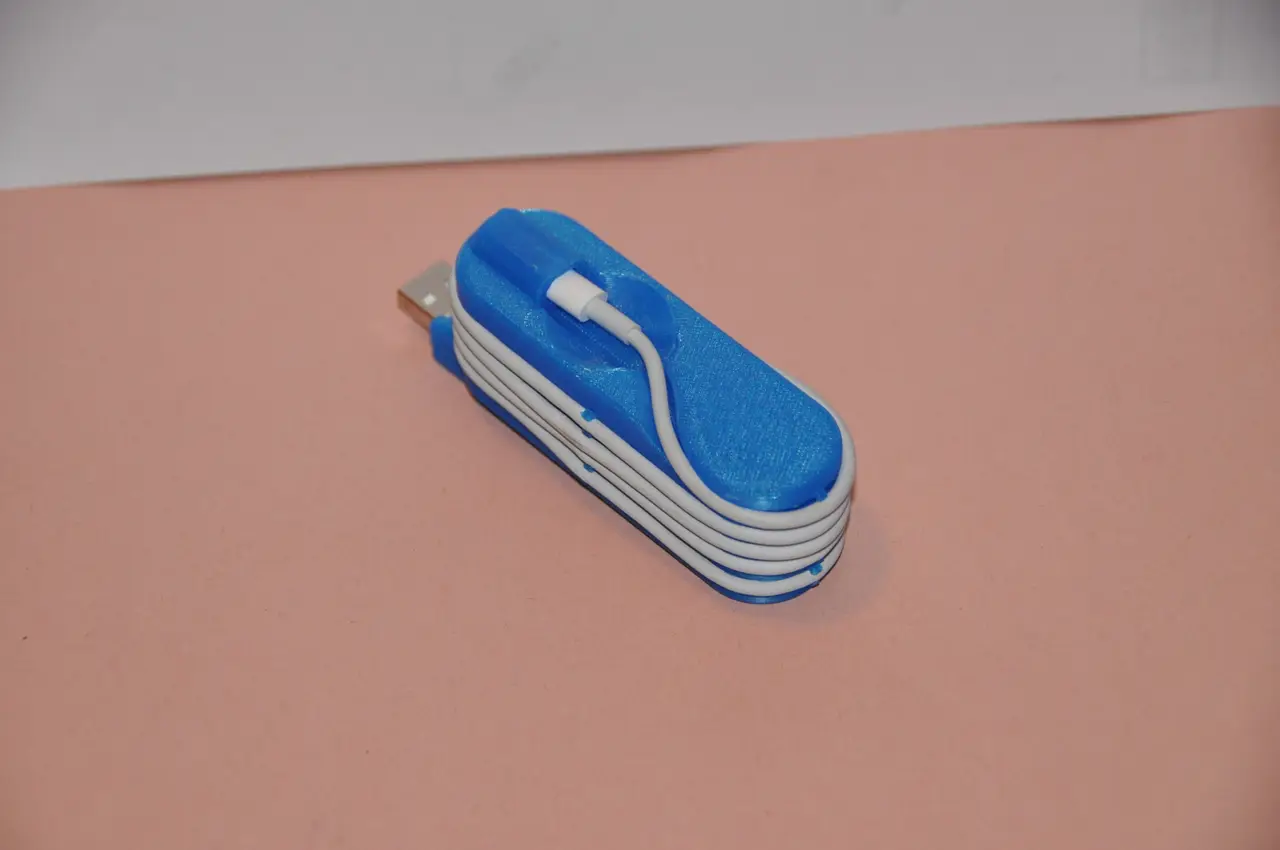 Iphone cord manager — modelo 3D