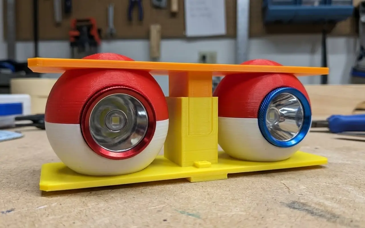 dual adjustable flash light holder — modelo 3D
