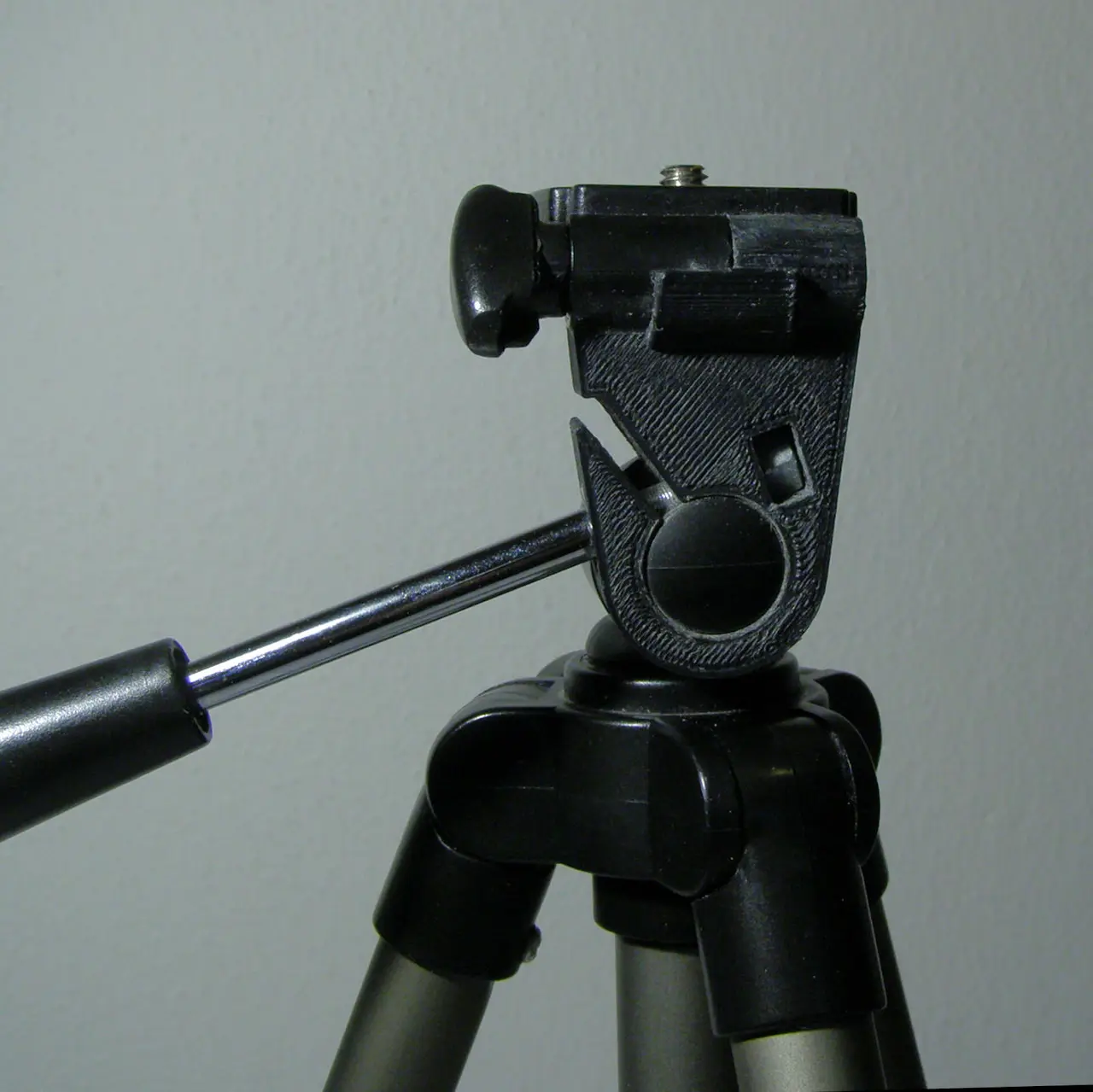 Photo tripod arm clamp — modelo 3D