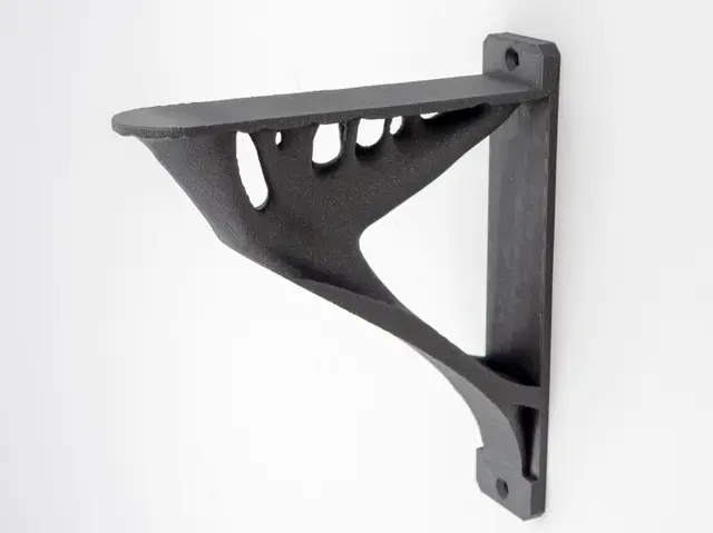 Smoothed topology optimized shelf bracket - Flat & thicker back, smoothed body — modelo 3D
